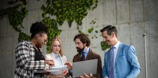 Diverse business team collaborating on global strategy. EU Inc. & Scaling cross-boarder teams