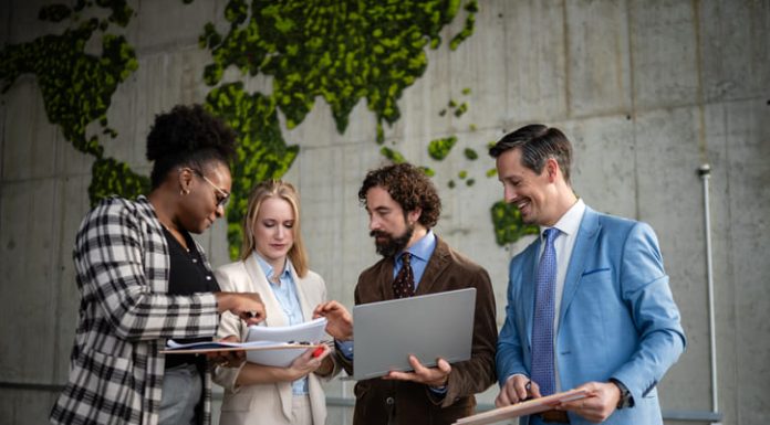 Diverse business team collaborating on global strategy. EU Inc. & Scaling cross-boarder teams