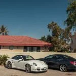 luxury cars parked near the house in the elite district of the city