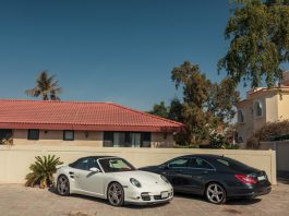 luxury cars parked near the house in the elite district of the city