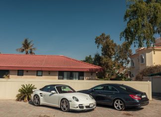 luxury cars parked near the house in the elite district of the city