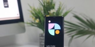 5 Reasons Why Buying Bitcoin (Probably) Still Makes Sense in 2026 a cell phone sitting on top of a stand on a desk for buying bitcoin