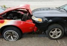 Cars are involved in a frontal collision.