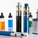 WHO’s Tobacco Warning to Europe Calls for Ambitious Reforms to Tackle Novel Products Modern electronic cigarettes, tobacco and bottles with assorted vape liquid on white background