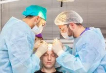 The Top 10 Leaders in Hair Transplant for 2026 in Turkey Baldness treatment. Hair transplant. Surgeons in the operating room carry out hair transplant surgery.