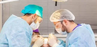 The Top 10 Leaders in Hair Transplant for 2026 in Turkey Baldness treatment. Hair transplant. Surgeons in the operating room carry out hair transplant surgery.