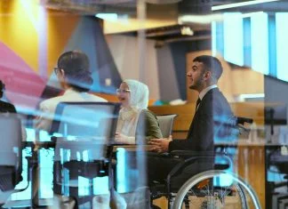 Corporate Mobility - In a modern glass startup office