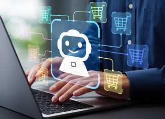 When AI Becomes the Customer: How Agentic Commerce Will Reshape Global Business AI becomes customer. Man using laptop computer to give instructions to AI at desk.