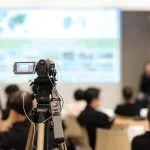 Media Training: Why It Matters Video camera recording in seminar room during media training