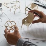 Designer sketching drawing design development product plan draft chair armchair Wingback Interior furniture prototype manufacturing production.