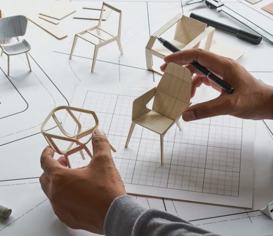 Designer sketching drawing design development product plan draft chair armchair Wingback Interior furniture prototype manufacturing production.