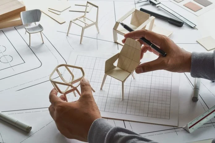 iStock-1359822886 (1) Designer sketching drawing design development product plan draft chair armchair Wingback Interior furniture prototype manufacturing production.