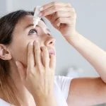 How to Relieve Dry Eyes from Contact Lenses: Best Solutions & Where to Buy Relieve Dry Eyes from Contact Lenses - putting eye drops