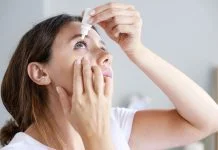 How to Relieve Dry Eyes from Contact Lenses: Best Solutions & Where to Buy Relieve Dry Eyes from Contact Lenses - putting eye drops