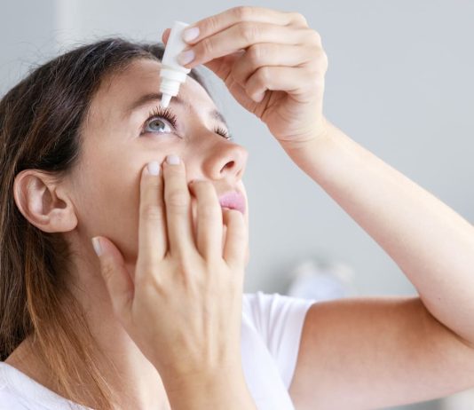 Relieve Dry Eyes from Contact Lenses - putting eye drops