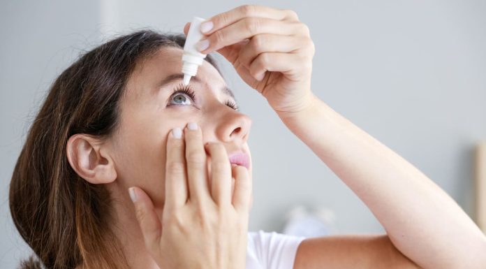 Relieve Dry Eyes from Contact Lenses - putting eye drops