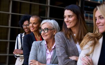 woman leaders, Graceful, smiling empowered diverse standing with arms crossed outdoor.