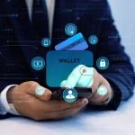Bank manager using laptop to connect digital Wallet technology. Online banking, financial, smart technology and E-wallet. Business financial technology and development software with smart technology. Digital Identity Wallet