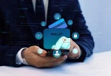 Bank manager using laptop to connect digital Wallet technology. Online banking, financial, smart technology and E-wallet. Business financial technology and development software with smart technology. Digital Identity Wallet