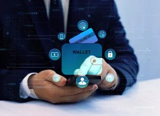 eIDAS 2.0 and the EU Digital Identity Wallet: Hype, Fear and Business Reality Bank manager using laptop to connect digital Wallet technology. Online banking, financial, smart technology and E-wallet. Business financial technology and development software with smart technology. Digital Identity Wallet