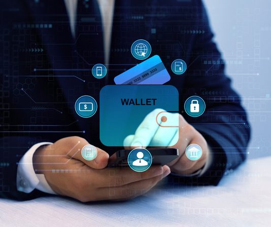 Bank manager using laptop to connect digital Wallet technology. Online banking, financial, smart technology and E-wallet. Business financial technology and development software with smart technology. Digital Identity Wallet