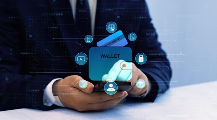 eIDAS 2.0 and the EU Digital Identity Wallet: Hype, Fear and Business Reality Bank manager using laptop to connect digital Wallet technology. Online banking, financial, smart technology and E-wallet. Business financial technology and development software with smart technology. Digital Identity Wallet