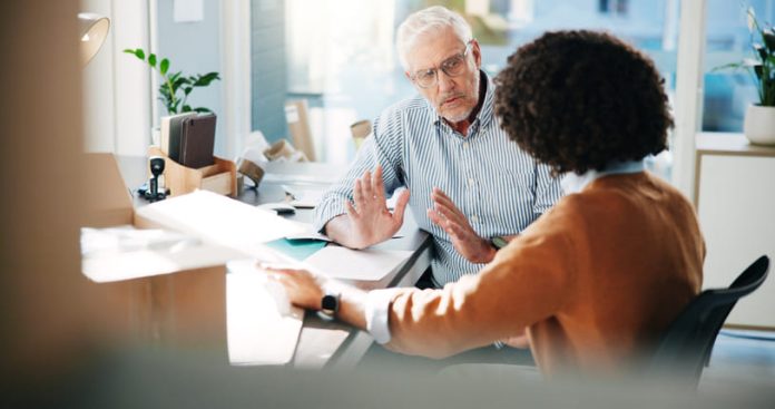 two employees having Conversations at Work