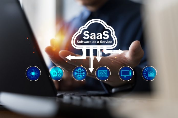 SaaS Software as a Service Cloud Technology for Digital Business and Innovation SaaS cloud computing concept with software as a service for business, data, and technology innovation, showing digital solutions, online services, and futuristic interface design.