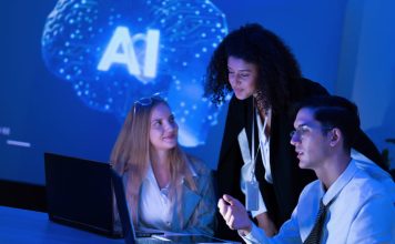 Talents in the AI Era. Team strategizing in the workplace with the use of technology