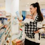 mom buying Organic Baby Formula in retails store