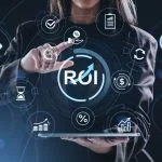 Businesswoman interacting with financial automation ROI icons on digital interface