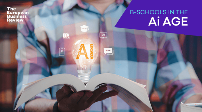Close-up of student holding open book displaying glowing light bulb hologram containing artificial intelligence icon, representing innovation in modern education plus futuristic learning