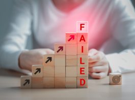 Text failed on the wooden block and the dartboard icon is on the floor, Failing ideas metaphor, Concept for challenge and fail in business or fail in Career Goal