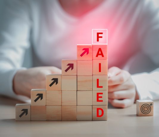 Text failed on the wooden block and the dartboard icon is on the floor, Failing ideas metaphor, Concept for challenge and fail in business or fail in Career Goal