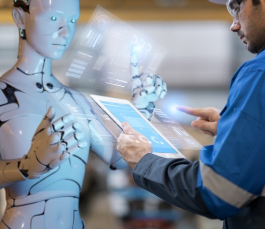 AI Isn’t Replacing Work. It’s Redefining It. Inventory fulfilment system computer-aided manufacturing digital smart AI, engineer and robot programming warehouse factory, futuristic industry modern futuristic background. AI Isn’t Replacing Work concept