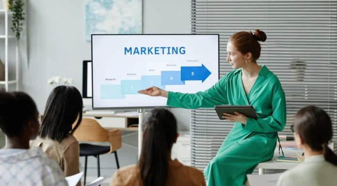 Businesswoman giving new info about marketing. Learning practical Skills for CMO