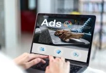 Human use laptop with video advertising branding, online content, freelance, sale, working online, content creator, marketing, Ads, digital marketing, branding, E-commerce, blog online on computer at home