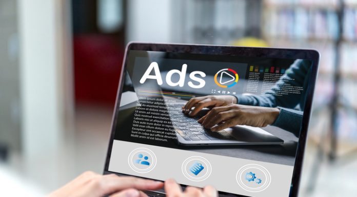 Beyond View Counts: Analyzing Essential Competitor Video Ad Metrics for Smarter Decisions Human use laptop with video advertising branding, online content, freelance, sale, working online, content creator, marketing, Ads, digital marketing, branding, E-commerce, blog online on computer at home