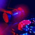The Channelisation Problem: Is Europe Regulating Online Gambling Too Hard? Europe Online Gambling - Gavel, Handcuffs, Poker Chips