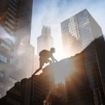 Man climbing up steep mountain. Business, achievement, success. Kabbalistic insights for success concept