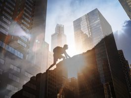 Man climbing up steep mountain. Business, achievement, success. Kabbalistic insights for success concept