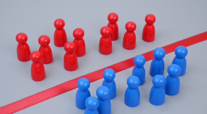 The Better Boards Podcast Series: Boardrooms and Battlegrounds – Closing the Geopolitical Risk Gap roups of blue and red people figures separated by red line. Geopolitica risks