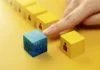 Choosing an AI Cube that Stand Out among many Human Worker
