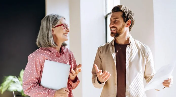 Empowerment in Action: Turning Skilled Managers Into “Freedom Coaches” Manager giving feedback to employee for career development
