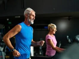 A Practical Guide to Building Lifelong Health and Wellbeing for Men Portrait of a senior man exercising in a gym. Protecting Men’s Lifelong Health concept