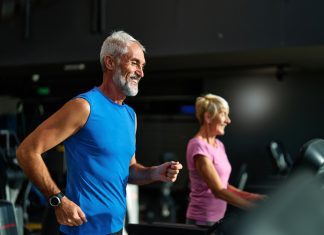 Portrait of a senior man exercising in a gym. Protecting Men’s Lifelong Health concept