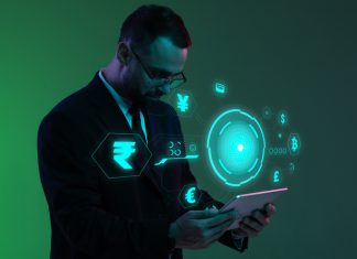 The Future of Digital Currency in 2026 is All About Architecture Businessman with digital currency icons and green holographic interface in neon lightning.