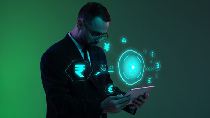 Businessman with digital currency icons and green holographic interface in neon lightning.