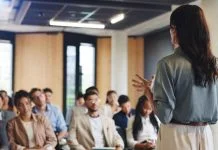 Workshop, training and feedback summit with coach, sales education and crowd for career development