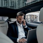 Why Your Best Executives are Wasting Hours on Logistics Executive working in the car for logistics tasks